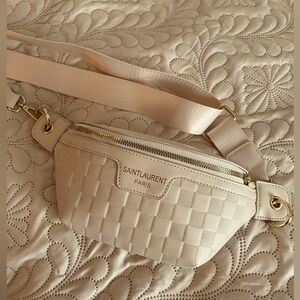 Unbranded adjustable crossbody bag.  Brand new never used. Excellent condition